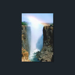 Africa, Zambia, Victoria Falls National Park. Canvas Print<br><div class="desc">COPYRIGHT Cindy Miller Hopkins / DanitaDelimont.com | AF51 CMI0012.jpg | Africa,  Zambia,  Victoria Falls National Park. Victoria Falls with rainbow in the spray of the falls. One of the seven natural wonders of the world.</div>