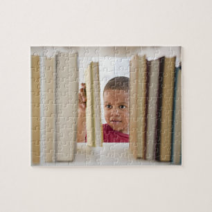 African American boy selecting book Jigsaw Puzzle