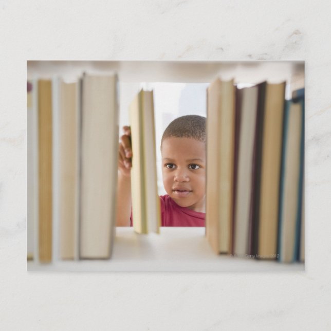 African American boy selecting book Postcard (Front)