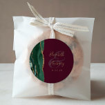 Agate Emerald Green Gold Script Burgundy Wedding Classic Round Sticker<br><div class="desc">This elegant modern wedding sticker features an emerald green watercolor agate geode design trimmed with faux gold glitter. Easily customise the gold-coloured text on a burgundy background,  with the names of the bride and groom in handwriting calligraphy over a large ampersand.</div>