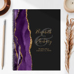Agate Geode Script Purple Gold Dark Wedding Plans Planner<br><div class="desc">This elegant modern wedding planner features a purple watercolor design trimmed with faux gold glitter. Easily customise the gold-coloured text on an off-black background, with the names of the bride and groom in handwriting calligraphy over a large grey ampersand. Add the title and wedding date below in italics. The back...</div>
