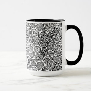 Agate slices in black and white mug
