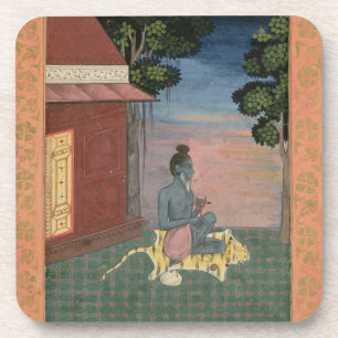 Aged ascetic seated on a tiger skin outside a buil coaster
