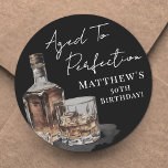 Aged To Perfection Birthday Classic Round Sticker<br><div class="desc">Aged To Perfection 50th Birthday Round Sticker. Celebrate a milestone with this whiskey-themed round sticker featuring a bold watercolor whiskey bottle and glass at the bottom left. The top right showcases “Aged To Perfection” along with the birthday person’s name and age in a mix of rustic handwritten script and classic...</div>