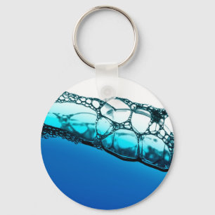 Air bubbles in blue water key ring