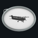 Aircraft Classic Cessna Black Silhouette Flying Belt Buckles<br><div class="desc">An Aircraft Cessna Silhouette Flying for any aviation enthusiast, customise this with text and your choice of background colour. Easily change the colour of this design background from the preset white to any colour of your choice in one step. Just click on the "Customise It!" button to reveal the colour...</div>