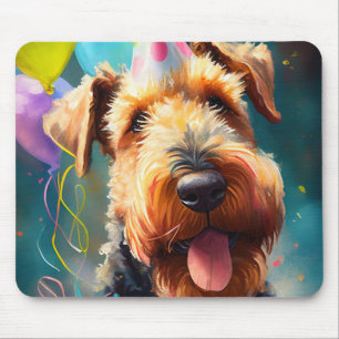 Airedale dog with birthday hat and balloons mouse pad