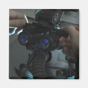 Airman adjusts the eyespan magnet