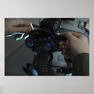 Airman adjusts the eyespan poster
