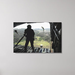 Airman watches a practice bundle fall canvas print