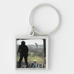 Airman watches a practice bundle fall key ring