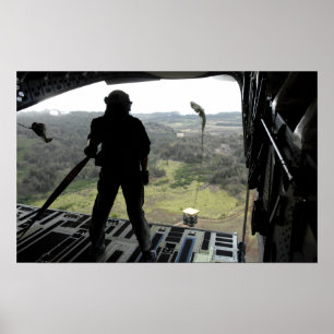 Airman watches a practice bundle fall poster