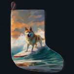 Akita Beach Surfing Painting Small Christmas Stocking<br><div class="desc">Immerse yourself in the playful world of canine adventure with this captivating painting. A spirited dog takes to the waves, skilfully riding the surf on a sun-kissed beach. The vibrant artwork beautifully captures the essence of beachside excitement as the dog fearlessly rides the waves, embodying the spirit of fun and...</div>