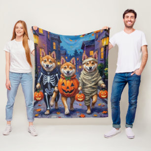 Akita Dogs Trick-or-Treating in Halloween Costumes Fleece Blanket
