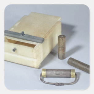Alabaster box and bronze and silver seal cylinders