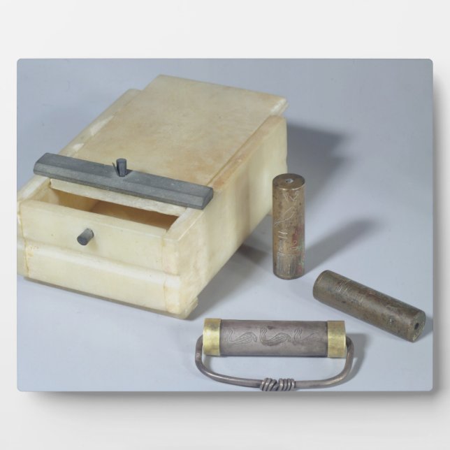 Alabaster box and bronze and silver seal cylinders plaque (Front)