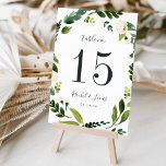 Alabaster | Personalized Table Number Card<br><div class="desc">Garden chic table number cards feature an oval wreath border of green watercolor foliage and white rose and peony flowers, framing your table number in rich off-black. Personalize with your names and wedding date, or name each table for an extra personal touch. Design repeats on reverse side. Coordinates with our...</div>