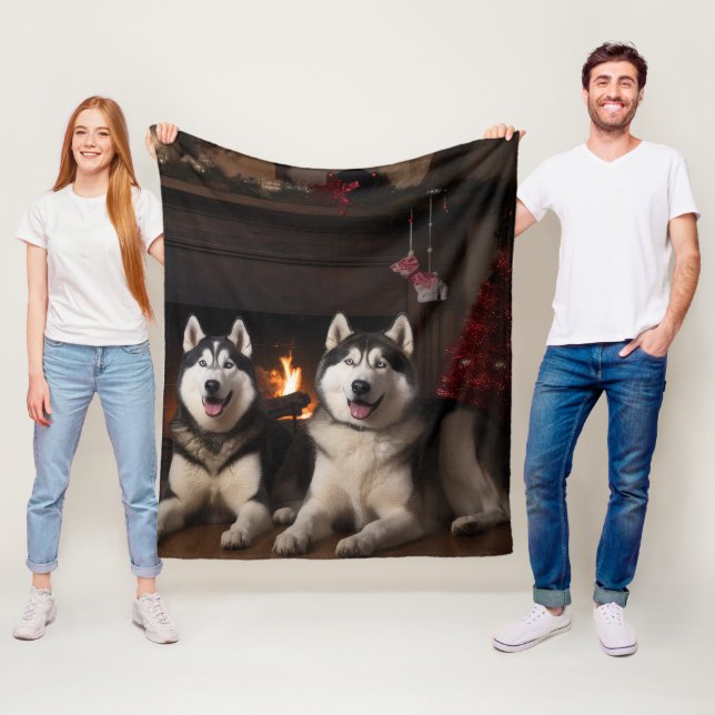 Alaskan Malamute by the Fireplace Christmas Fleece Blanket (In Situ)