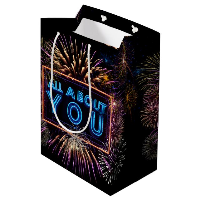 All About You Neon Sign With Fireworks Medium Gift Bag (Back Angled)