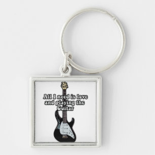 All i need is love and playing the guitar. key ring