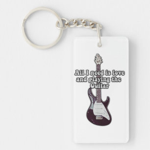 All i need is love and playing the guitar. vintage key ring