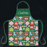 All-Over Print Apron<br><div class="desc">A stylish and modern Christmas apron pattern with retro-inspired geometric illustrations of ornaments,  stockings,  candy canes,  gifts,  Christmas trees,  snowflakes,  bells and more. This can be personalised with a name,  monogram or your own message. A fun & unique Christmas gift. Colours include; green,  red,  white,  blue and pink.</div>