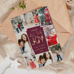 All the Joy | Multi Photo Collage<br><div class="desc">Fun and festive holiday photo card in a modern jewel tone colorway features eight photos arranged in a collage layout. "Wishing you all the joy" appears in the centre in gold foil lettering on a rich burgundy plum background accented with stars. Personalise with your personal greeting, your family name, and...</div>