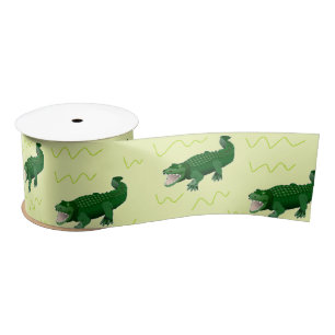 Alligator on yellow satin ribbon
