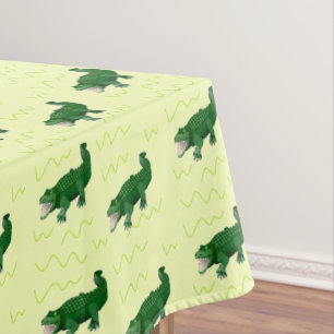 Alligator on yellow tablecloth
