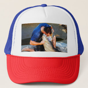 alligator wrestler with his head in the mouth trucker hat