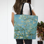 Almond Blossoms | Vincent van Gogh Tote Bag<br><div class="desc">Almond Blossoms (1890) by Dutch artist Vincent van Gogh (1853-1890). Van Gogh's Almond Blossoms painting showcases delicate white flowers set against a vibrant turquoise sky, symbolising new life and renewal. Inspired by Japanese art, the elegant branches and flowing lines create a sense of serenity and natural beauty. The textured brushstrokes...</div>