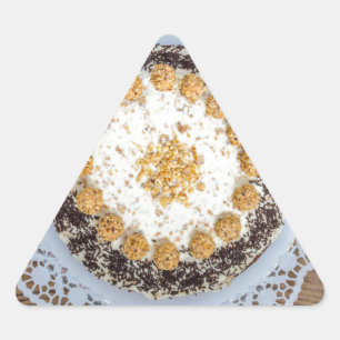 Almond nut cake on rustic wood triangle sticker