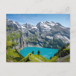 Alpine lake Oeschinensee in Switzerland Postcard