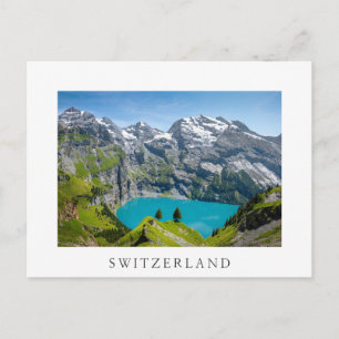Alpine lake Oeschinensee in Switzerland Postcard