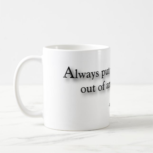 "Always put your drinks out of arm's way." Mug (Left)