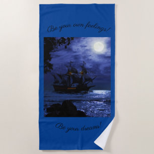 Amazing pirate old ship on a blue sea beach towel