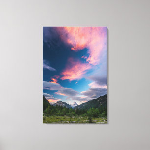 Amazing sunset clouds over mountain Mangart Canvas Print