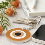 Amber Mati Evil Eye symbol talisman keychain<br><div class="desc">Rare Amber Mati Evil Eye symbol talisman keychain. Famous mati ancient Greek / Turkish icon for protection and good luck. Custom colour round key chain gift. Personalise with a photo on the back optionally.</div>