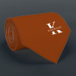 Amber Orange Elegant Monogram   Name | Two-Sided Tie<br><div class="desc">An elegant necktie featuring a bold white monogram across an Amber color background. On top of this monogram sits your first or last name spelled out in all capitals. If you prefer a bolder look for the personal name inside of the large letter you can do the following: Use the...</div>