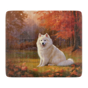 American Eskimo in Autumn Leaves Fall Inspired Cutting Board