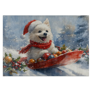 American Eskimo in Sledge Let it Snow Christmas Cutting Board