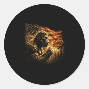 American flag bigfoot blowing dandelion vintage classic round sticker