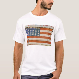American flag painted onto fireworks stand near T-Shirt