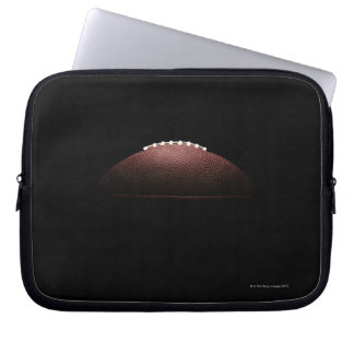 American football ball on black background laptop sleeve