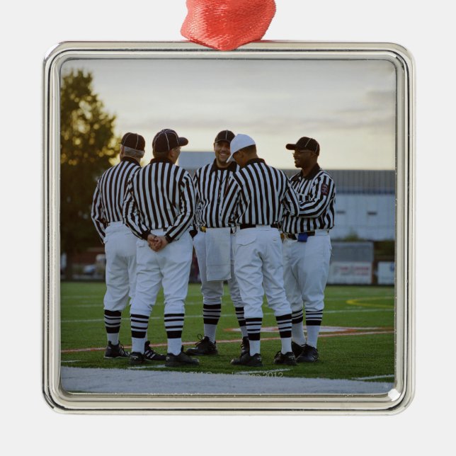 American football referees talking in field metal tree decoration (Front)