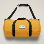 American Nostalgia Classic Simple Minimal Mustard Duffle Bag<br><div class="desc">This american nostalgia style classic design in mustard yellow features a patch style emblem with a monogram name and framed border,  featuring informal handwritten script and modern block typography. The text can be customised with your name for a design as unique as you are!</div>
