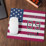 American Soccer Athlete Personalized Stars Stripes Mouse Pad<br><div class="desc">Enhance your workspace with this high-quality mousepad featuring a bold "Team USA" soccer theme. This durable desk accessory provides a smooth surface for precise tracking while showcasing your national pride with a vibrant stars and stripes background. The design is fully personalizable with a custom name and jersey number, both featuring...</div>
