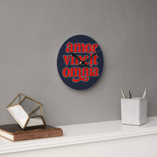 Amor vincit omnia round clock