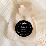 Amour | Black Illustrated French Bow Wedding Classic Round Sticker<br><div class="desc">This chic and elegant wedding favour sticker features a hand drawn,  wavy illustrated frame with a bow,  and stylish handwritten script for a Parisian or French style wedding invitation. This classic colour option is dark black and ivory.</div>