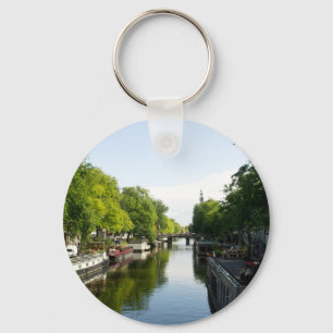 Amsterdam Canal with Houseboats and Lush Trees Key Ring